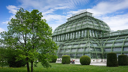 architectural photography of gray and green building thumbnail