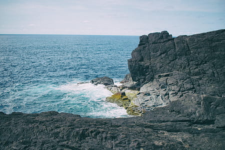 Landscape Photography of Boulder Near Body of Water thumbnail
