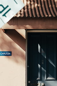 Carlton labeled sign near door thumbnail