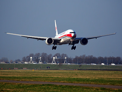 white plane during daytime thumbnail
