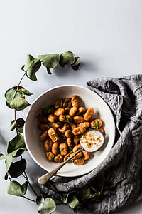 white ceramic bowl and silver spoon thumbnail