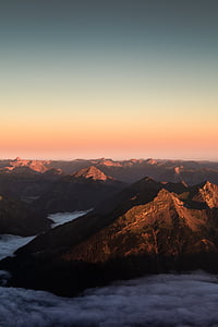 mountain range under blue sky thumbnail