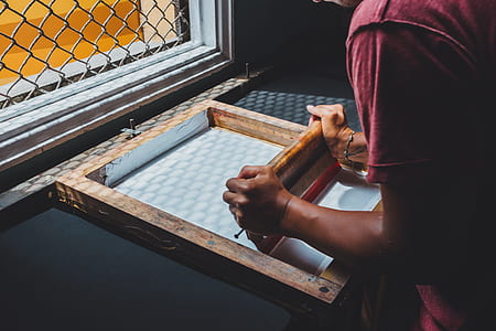 person holding silk screen planer thumbnail
