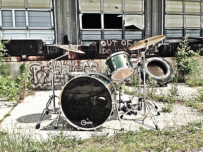 black and gray drum set across black tire thumbnail