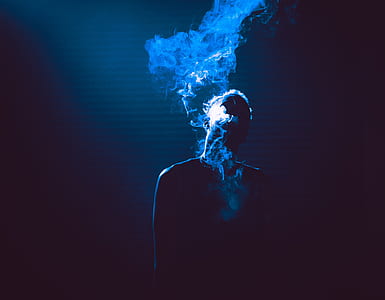 man surrounded with smoke thumbnail
