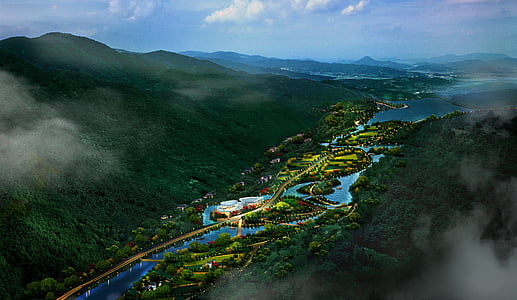 aerial photography of building between mountain thumbnail