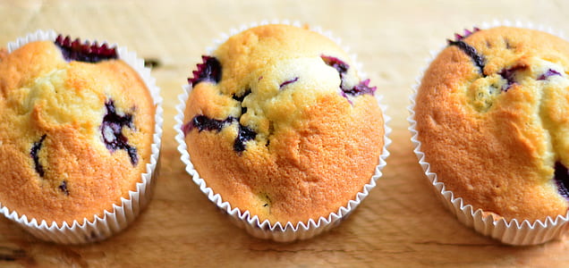 close-up photo of three baked cupcakes thumbnail
