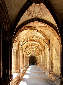 brown concrete arch hallway thumbnail