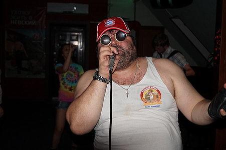 man singing on microphone thumbnail