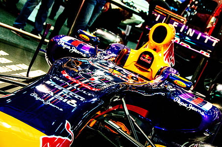 closeup photography of blue and yellow Red Bull formula 1 race car thumbnail