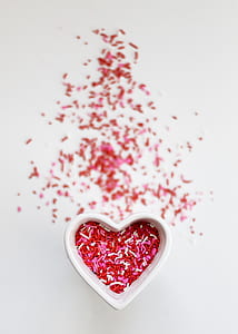 white heart shaped case filled with red and white pill thumbnail