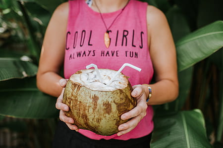 woman holding coconut juice thumbnail