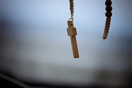 shallow focus photography of brown wooden cross accessory thumbnail