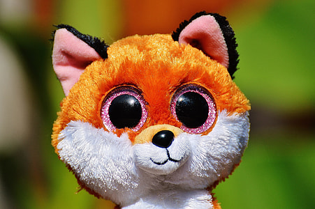 closeup photo of brown and white dog plush toy thumbnail