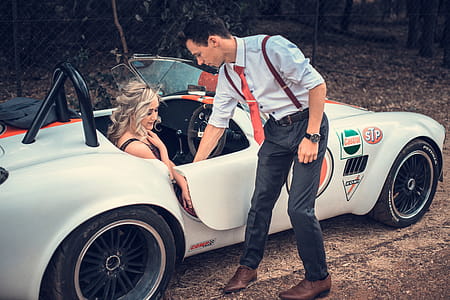 Man Standing Beside Convertible thumbnail