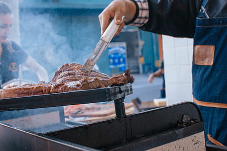 Man Cooking Beef thumbnail