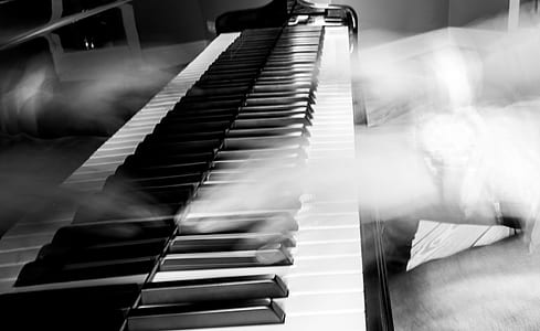photo of person playing piano thumbnail