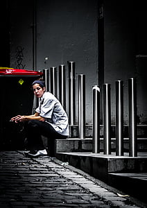 woman sitting on gray concrete staircase thumbnail