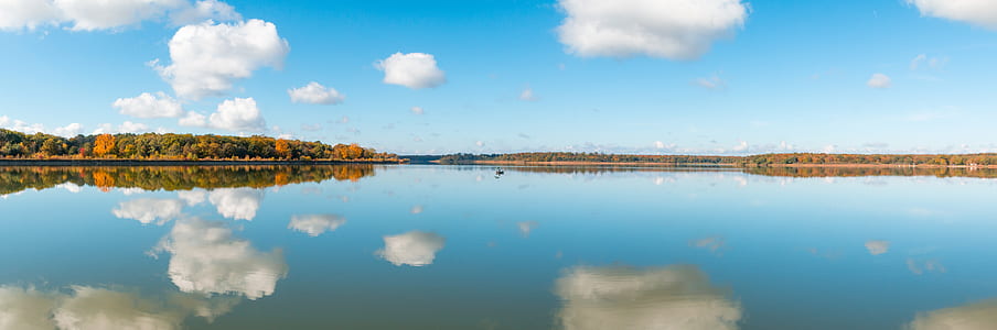 panorama photography of body of water thumbnail