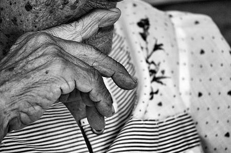 greyscale photo of old person wearing top thumbnail