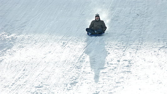 person sliding on snow field thumbnail
