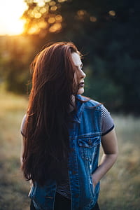 woman in blue denim vest thumbnail