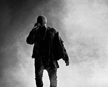 grayscale photo of man with jacket thumbnail