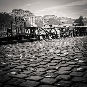 three step-through bicycles parked near dock thumbnail