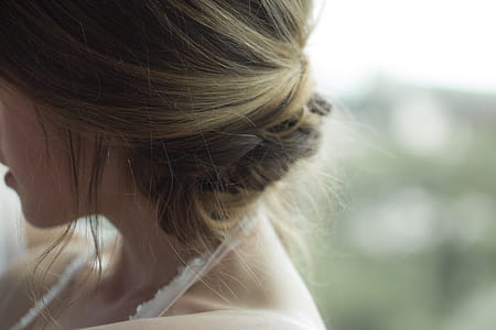 Woman Wearing White Halter-neck Top thumbnail