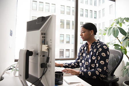Woman Wearing Black and White Floral Dress Shirt thumbnail