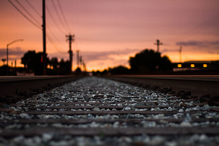 low angle view photography of train rail thumbnail