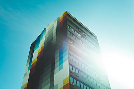 low angle photograph of multicolored building thumbnail