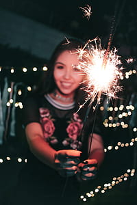 Woman Holding Firecrackers thumbnail