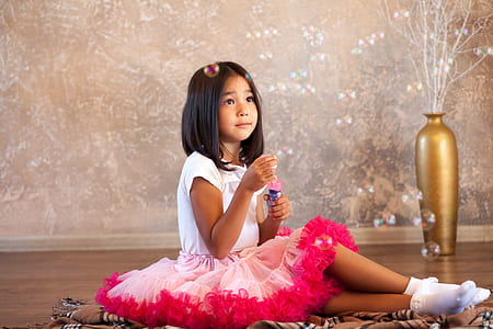 girl sitting on floor bottle thumbnail