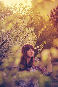 woman wearing multicolored 3/4 sleeved dress near white leaf tree thumbnail