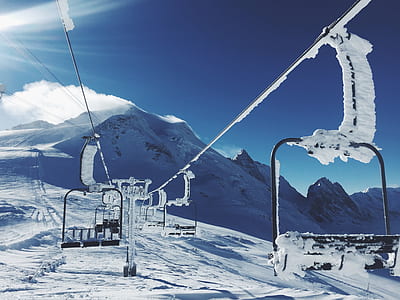 empty chair ski lift over the snow thumbnail