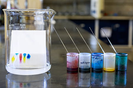 Chemistry of thin layer chromatography with plate, solvent and samples. thumbnail
