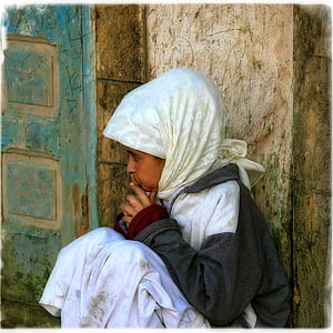 woman wearing white and black full-zip hoodie during daytime thumbnail
