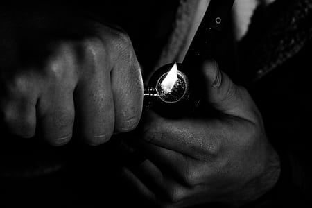 Photo of Man Holding Lighter thumbnail