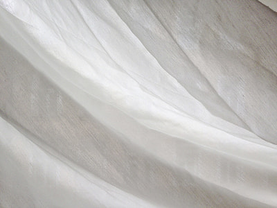 person showing white textile thumbnail