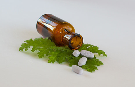 brown bottle with medication pills thumbnail
