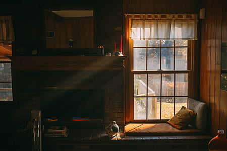 fireplace near brown pillow thumbnail