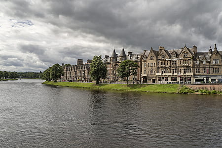 gray houses near body of water thumbnail