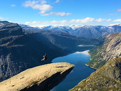 person do back flip on cliff thumbnail