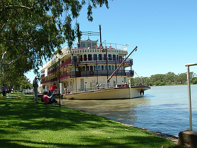 people standing near boat thumbnail