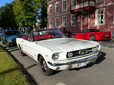 white Ford Mustang Fastback on road thumbnail