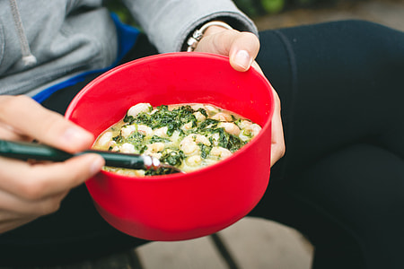 Cooking shrimps with spinach outside camping thumbnail