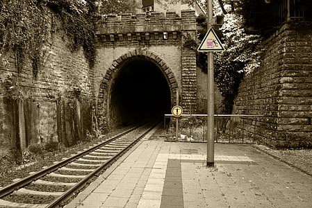 train tunnel photography during daytime thumbnail
