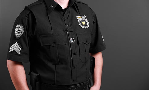 man wearing black uniform thumbnail
