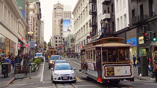 one way road with vehicles photograph thumbnail